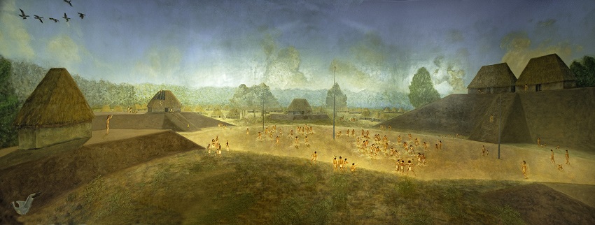 landscape print showing ancient village in background
